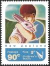 Colnect-4011-005-Child--amp--Rabbit.jpg