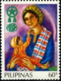 Colnect-1353-788-Christmas--Child-touching-mother--s-face.jpg