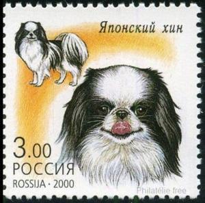 Colnect-2024-520-Japanese-Chin-Canis-lupus-familiaris.jpg