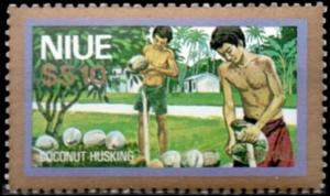 Colnect-5607-623-Husking-coconuts.jpg
