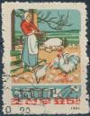 Colnect-3291-090-Woman-with-chickens-and-pigs-cans.jpg