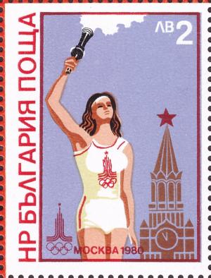 Colnect-5487-158-Girl-with-Olympic-Fire-Spasskaya-Tower-Moscow.jpg