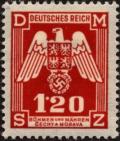 Colnect-617-796-Eagle-with-shield-of-Bohemia-Empire-badge.jpg