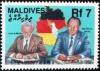 Colnect-4175-097-East-West-German-foreign-ministers-sign-re-unification-doc.jpg