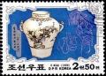 Colnect-2374-414-White-china-pot-with-blue-flower.jpg