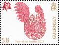Colnect-4433-124-Sitting-Rooster-with-egg.jpg