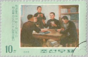 Colnect-2616-818-Kim-Il-Sung-teaching-students-about-the-revolution.jpg