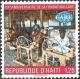 Colnect-4135-065-Haitians-spinning-cotton-CARE-workshop.jpg