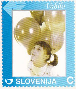 Colnect-3012-593-Girl-with-baloons.jpg
