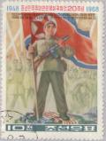 Colnect-2614-074-Soldier-with-flag-and-machine-gun.jpg
