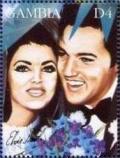 Colnect-4686-028-Elvis-with-his-wife-Priscilla.jpg