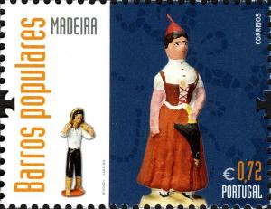 Colnect-2750-066-Madeira--Woman-in-traditional-costume-----Man-with-wineskin.jpg