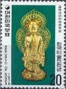 Colnect-2739-948-Golden-Amitabha-with-halo-8th-cent.jpg