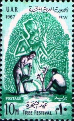 Colnect-1311-947-Workers-planting-Tree.jpg