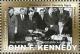Colnect-4338-424-President-J-F-Kennedy-signs-Peace-Corps-Act.jpg