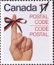Colnect-748-310-Postal-Code---Knotted-ribbon-on-female-hand.jpg