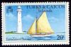 Colnect-1211-186-Grand-Turk-lighthouse-and-sailboat.jpg