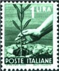 Colnect-1112-627-Hand-planting-an-olive-tree.jpg