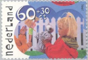 Colnect-2548-312-Children-playing-with-doll-and-robot.jpg