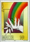 Colnect-131-183-Hand-holding-leaf-and-rainbow.jpg