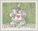 Colnect-133-059-Clown-Holding-paper-with-heart.jpg
