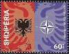 Colnect-1539-633-NATO-emblem-and-heraldic-eagles.jpg