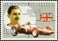 Colnect-2229-865-Graham-Hill-1929-1975-and-BRM-P57.jpg