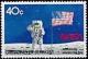 Colnect-4369-983-Astronaut-Neil-Armstrong-saluting-US-Flag.jpg