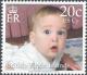 Colnect-4073-468-William-as-toddler-on-chest.jpg