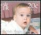 Colnect-5352-568-William-as-toddler-on-chest.jpg