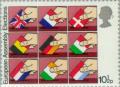 Colnect-122-119-Hands-placing-National-Flags-in-Ballot-Boxes---10%C2%BDp.jpg