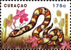 Colnect-2603-475-Snake-and-flowers.jpg