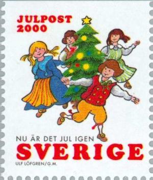 Colnect-164-985-Children-dancing-round-christmas-tree.jpg