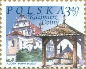 Colnect-1283-117-Church-and-well-Kazimierz-Dolny.jpg