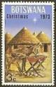 Colnect-1753-394-Ass-and-foal-African-huts.jpg