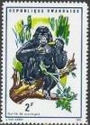 Colnect-1256-033-Gorilla-eating-bananas-Gorilla-beringei.jpg