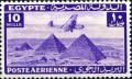 Colnect-1280-922-Aircraft-flying-over-the-Pyramids-of-Giza.jpg