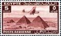 Colnect-1282-028-Aircraft-flying-over-the-Pyramids-of-Giza.jpg