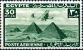 Colnect-1282-030-Aircraft-flying-over-the-Pyramids-of-Giza.jpg