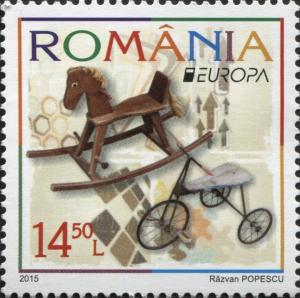 Colnect-2841-978-Rocking-Horse-and-Tricycle.jpg