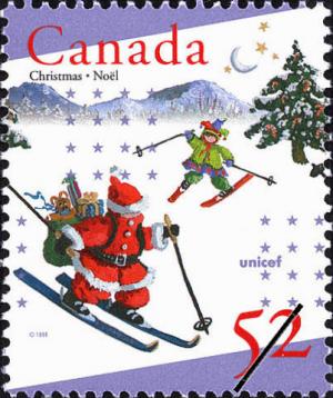 Colnect-2879-766-Santa-and-elf-Skiing.jpg