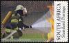 Colnect-5423-383-Firefighter-in-a-Fire-Emergency-Situation.jpg