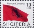 Colnect-1533-616-Albanian-flag-blowing-in-wind.jpg