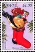 Colnect-3544-803-American-goldfinch-on-stocking.jpg
