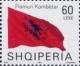 Colnect-1533-622-Albanian-flag-blowing-in-wind.jpg
