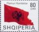 Colnect-1533-625-Albanian-flag-blowing-in-wind.jpg