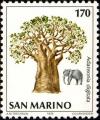 Colnect-1394-550-African-Elephant-Loxodonta-africana-Baobab-Adansonia-dig.jpg