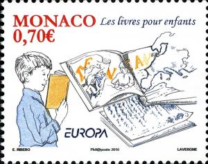 Colnect-1153-636-Boy-reading-book-pages-of-text-map-of-Europe.jpg