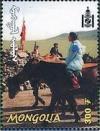 Colnect-1292-067-Mongolian-girl-on-horse.jpg