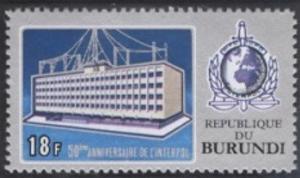 Colnect-2188-623-INTERPOL-buidling-and-emblem.jpg
